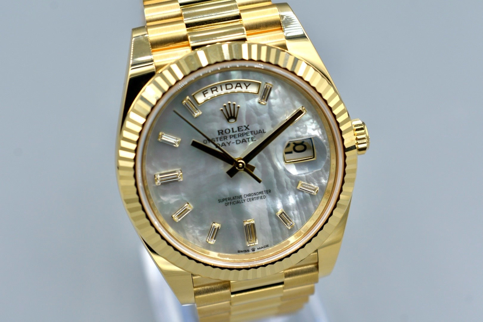 Rolex Day Date 40 Yellow Gold Mother of Pearl Baguette Diamond Markers 228238 2025