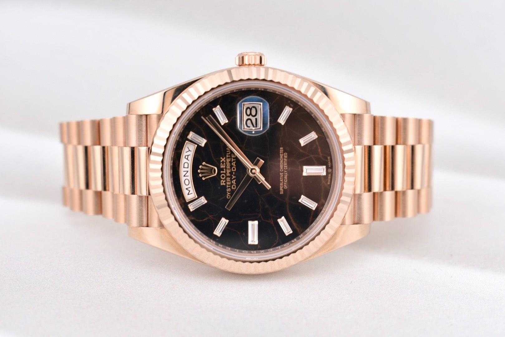 Rolex Day Date 40 Eisenkiesel Baguette Diamond Dial Everose Gold 228235