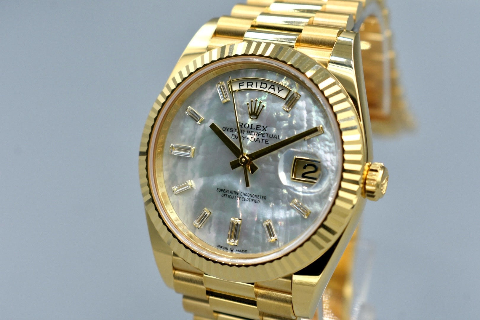 Rolex Day Date 40 Yellow Gold Mother of Pearl Baguette Diamond Markers 228238 2025