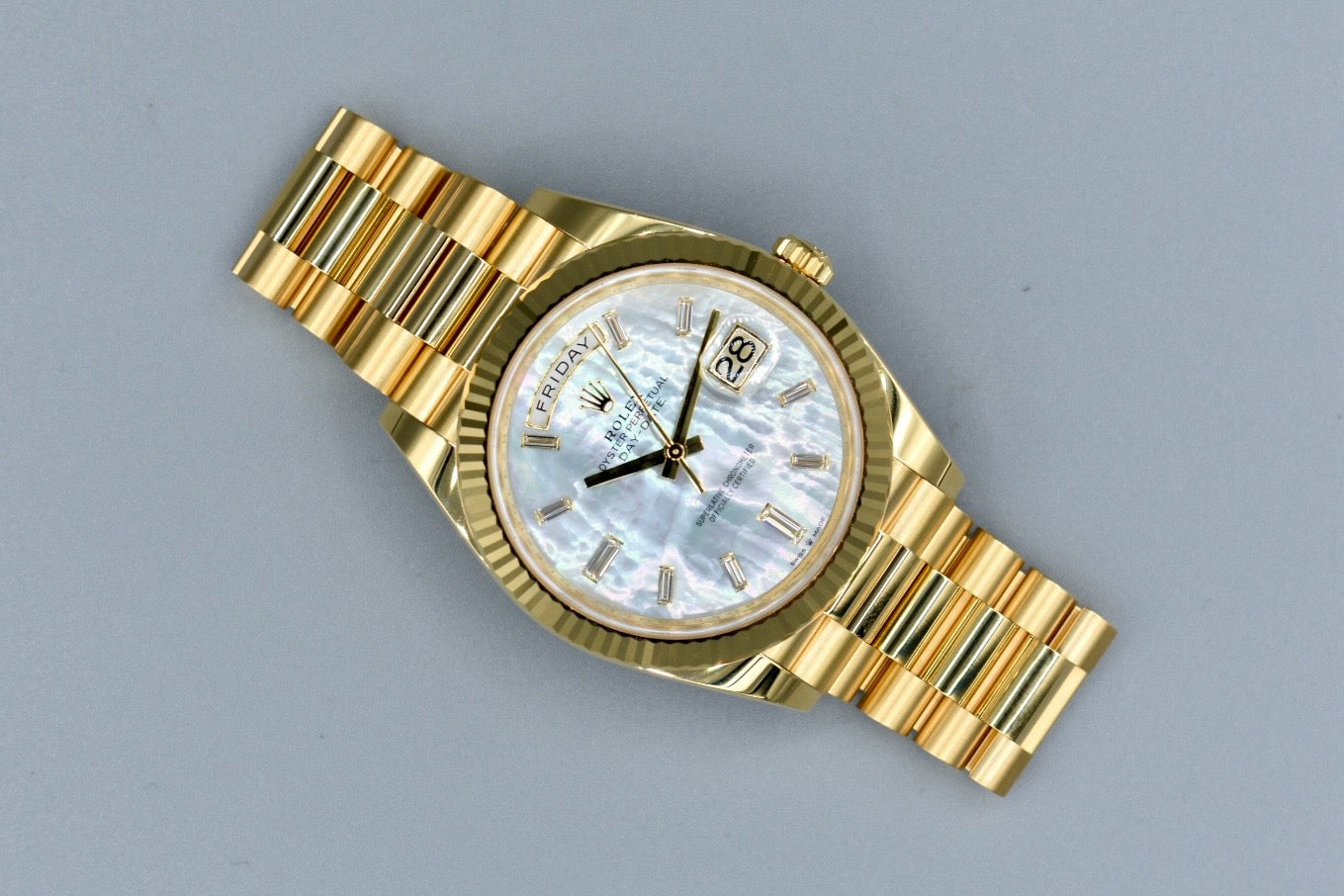 Rolex Day Date 40 Yellow Gold Mother of Pearl Baguette Diamond Markers 228238 2025