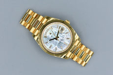 Rolex Day Date 40 Yellow Gold Mother of Pearl Baguette Diamond Markers 228238 2025