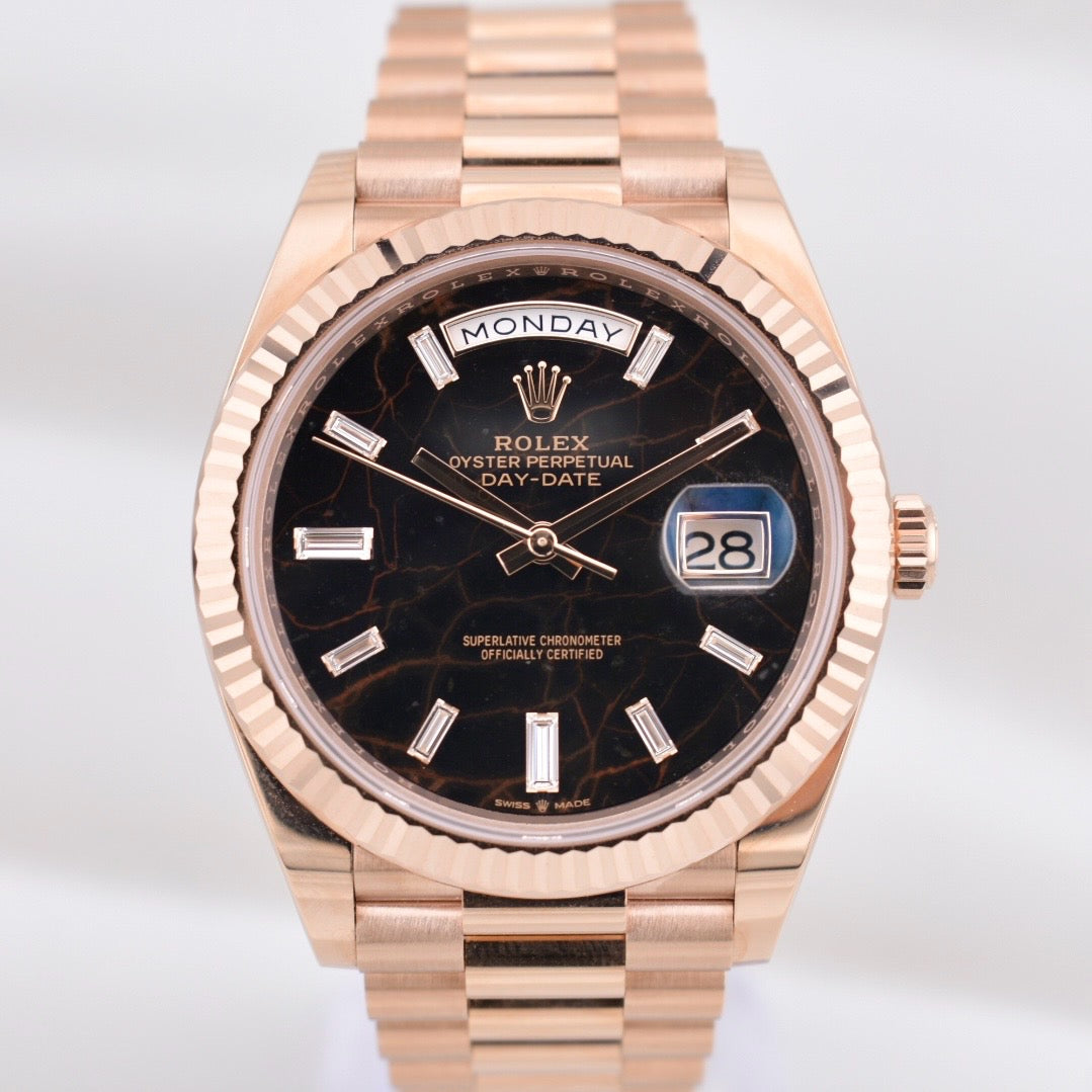 Rolex Day Date 40 Eisenkiesel Baguette Diamond Dial Everose Gold 228235
