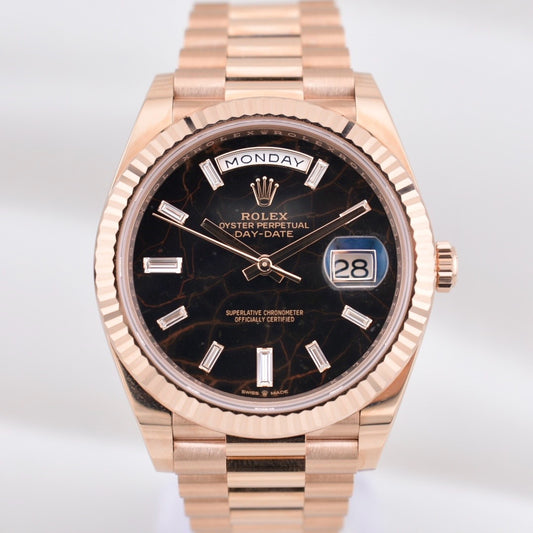 Rolex Day Date 40 Eisenkiesel Baguette Diamond Dial Everose Gold 228235