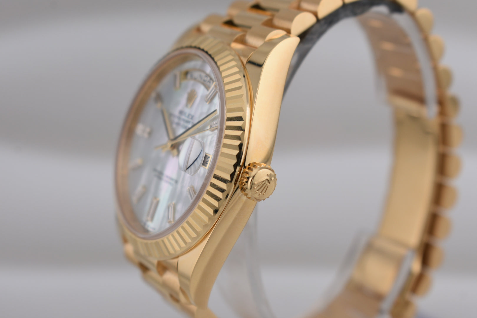 Rolex Day Date 40 Yellow Gold Mother of Pearl Baguette Diamond Markers 228238 2025