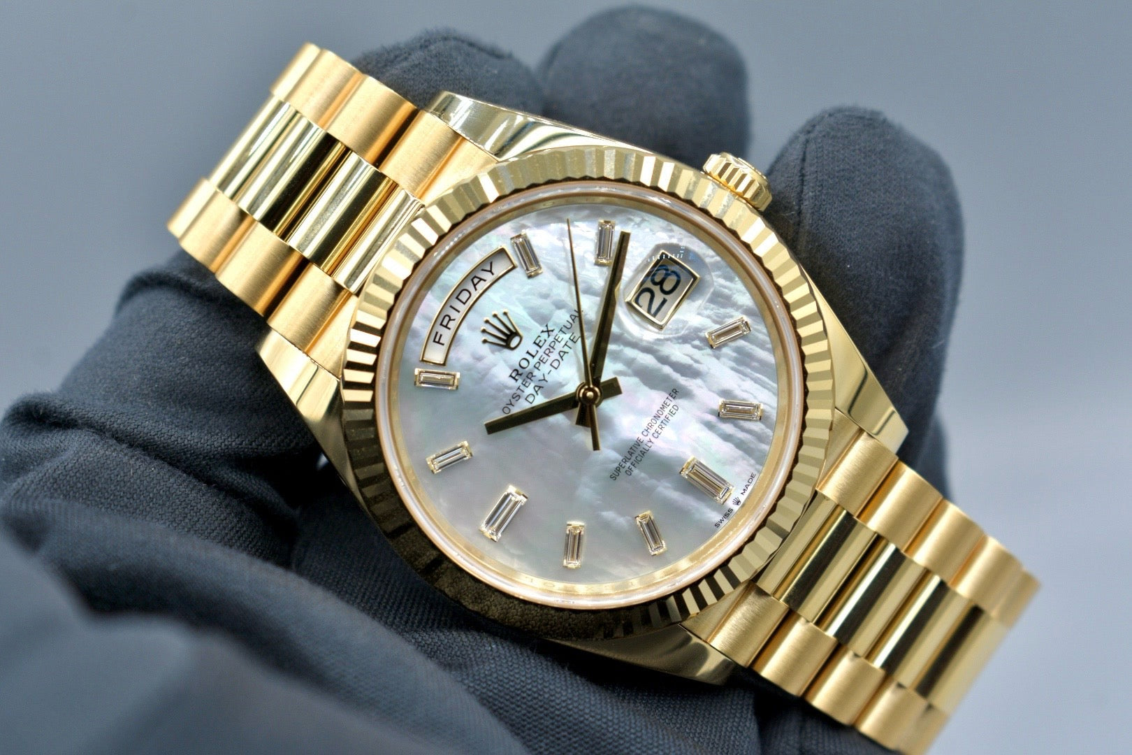 Rolex Day Date 40 Yellow Gold Mother of Pearl Baguette Diamond Markers 228238 2025