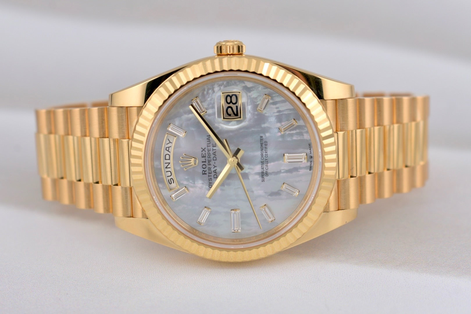 Rolex Day Date 40 Yellow Gold Mother of Pearl Baguette Diamond Markers 228238 2025