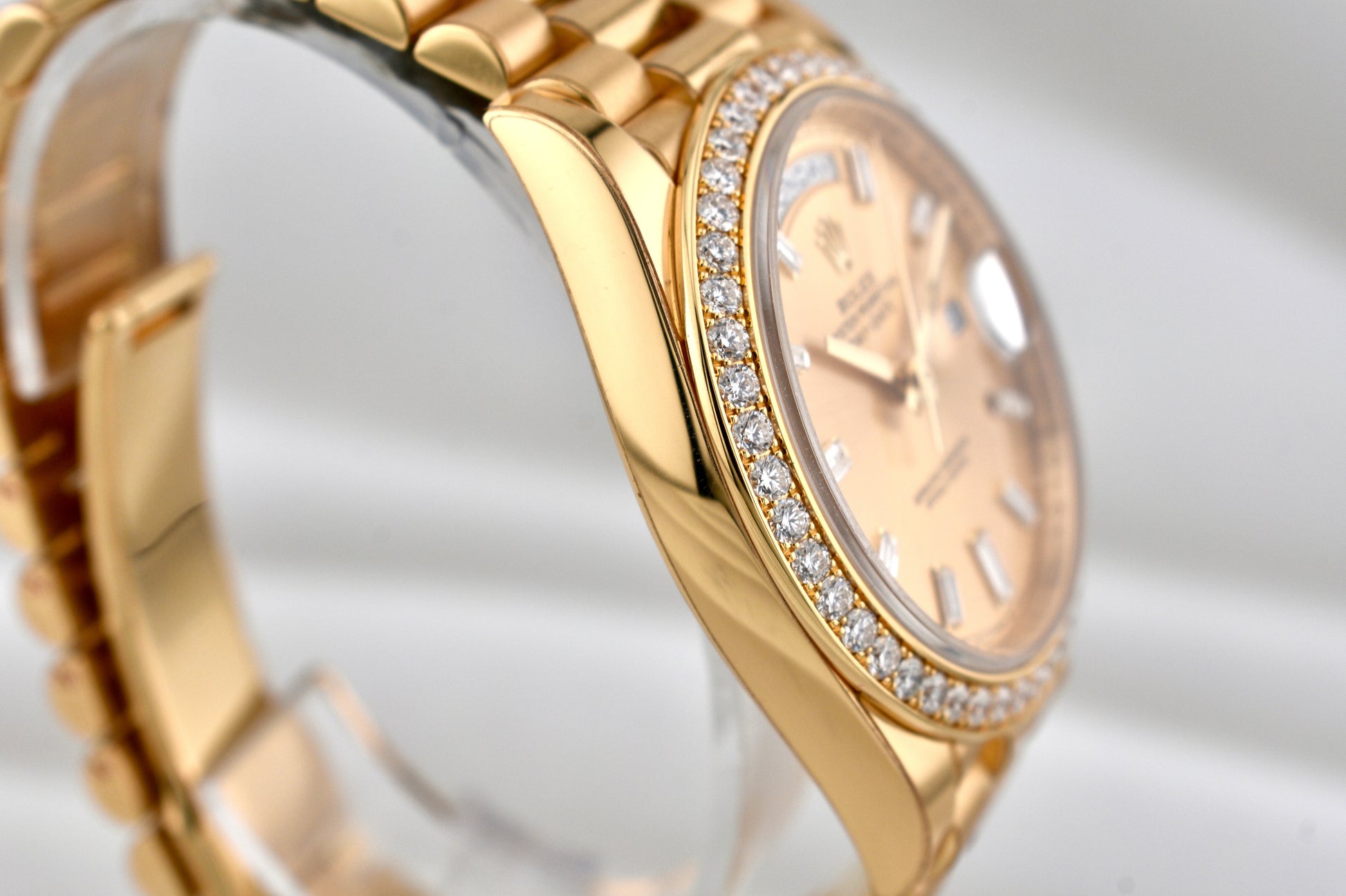 Rolex Day Date 40 Yellow Gold Champagne Baguette Diamond Dial 228348RBR 2024