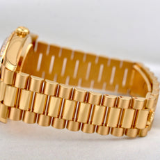 Rolex Day Date 40 Yellow Gold Champagne Baguette Diamond Dial 228348RBR 2024