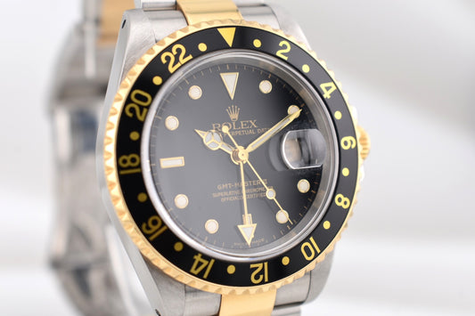 Rolex GMT Master II Two Tone Yellow Gold Black Dial 16713 2000
