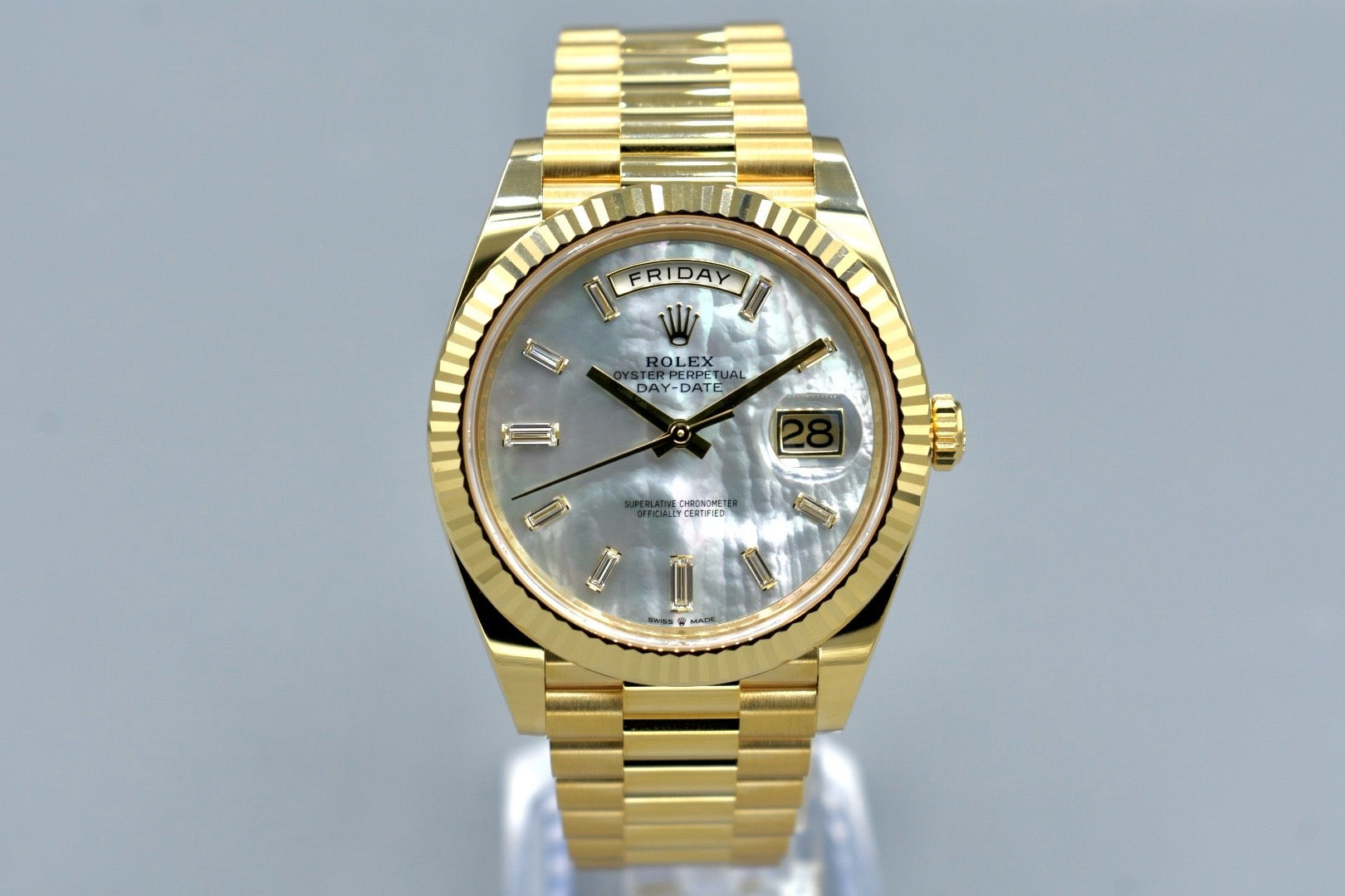 Rolex Day Date 40 Yellow Gold Mother of Pearl Baguette Diamond Markers 228238 2025