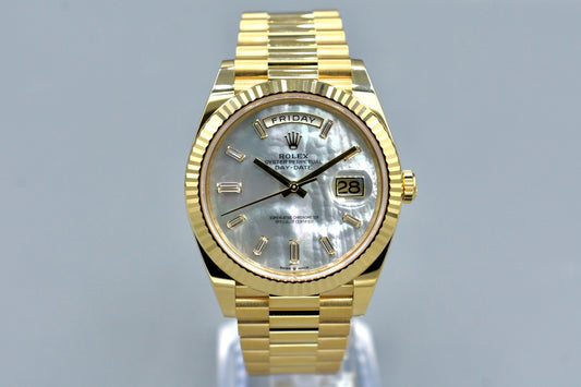 Rolex Day Date 40 Yellow Gold Mother of Pearl Baguette Diamond Markers 228238 2025