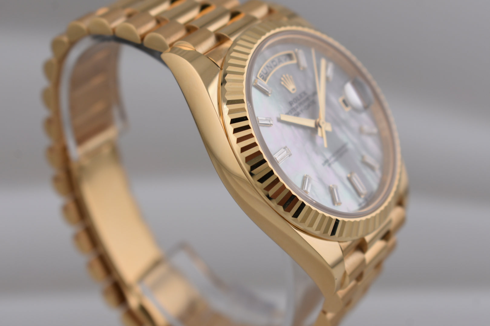 Rolex Day Date 40 Yellow Gold Mother of Pearl Baguette Diamond Markers 228238 2025
