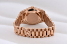 Rolex Day Date 40 Eisenkiesel Baguette Diamond Dial Everose Gold 228235